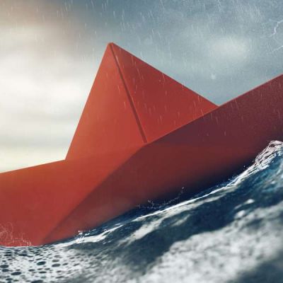 Risk concept with a red paper boat in the storm on the sea (3D R
